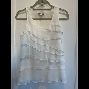 White ruffle blouse.